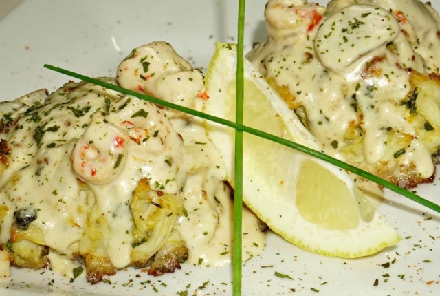 Jumbo lump crab cake topped with a crawfish cream sauce